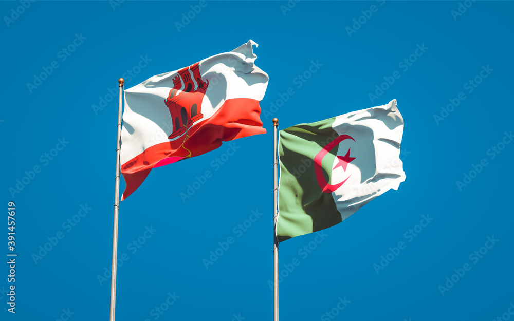 Beautiful national state flags of Gibraltar and Algeria together at the sky background. 3D artwork concept. Beautiful national state flags of Gibraltar and Algeria together at the sky background. 3D artwork concept.