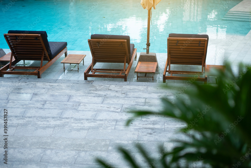 Pool chair bed in summer sunlight