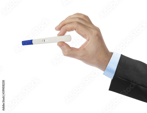 Hand with pregnancy test