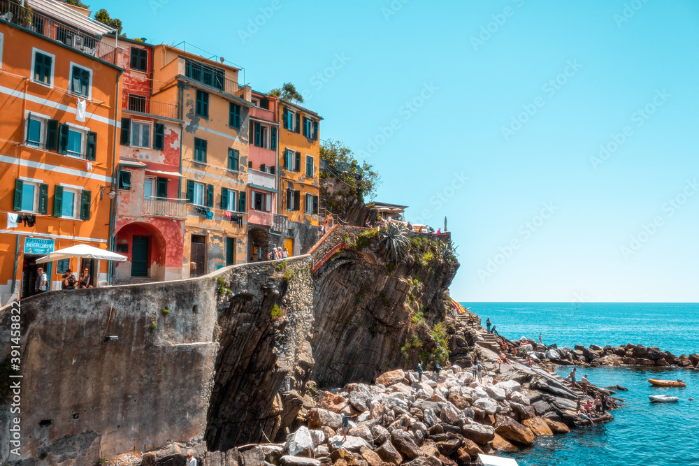 Colorful houses on top of the sea.
Rio maggiore, cinque terre Italy. 
