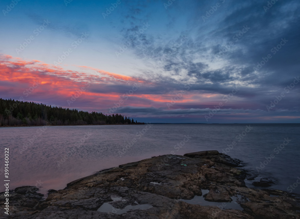 Sunset over the Onega Lake in the Republic of Karelia, northwest of Russia