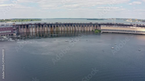 Wallpaper Mural The beautiful river is surrounded by green and fresh vegetation in the city. Dnieper hydroelectric power station in Zaporozhye Torontodigital.ca