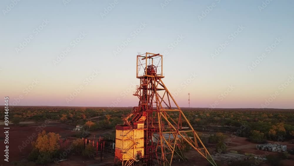 Rising Shot of the Headframe in an Abandoned Mining Town at Sunset.
Location: Warrego, Northern Territory, Australia. Rising Shot of the Headframe in an Abandoned Mining Town at Sunset.
Location: Warrego, Northern Territory, Australia.