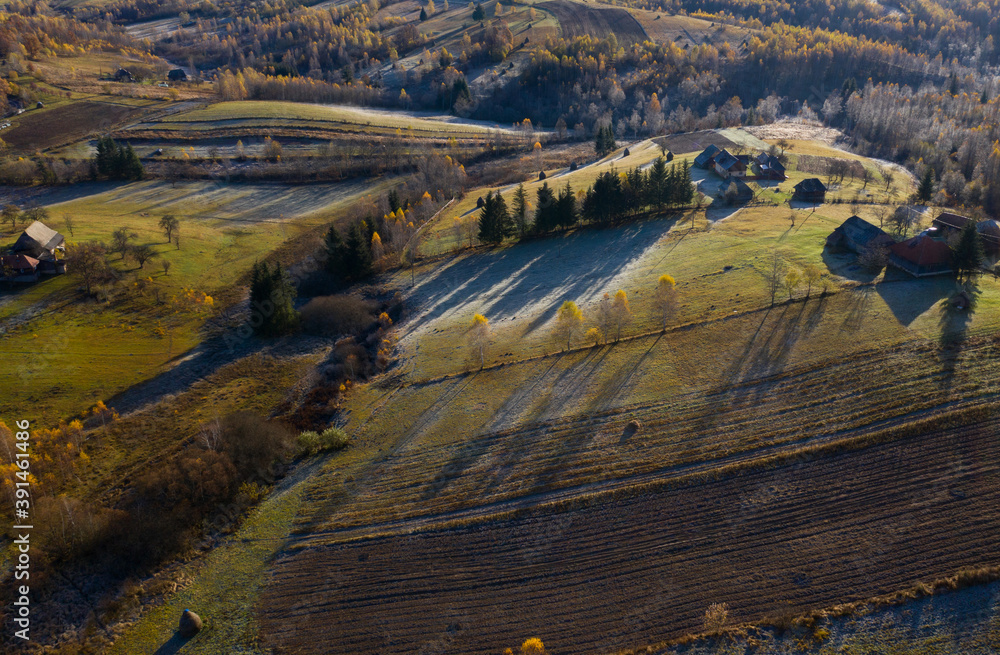 Aerial view of autumn mountain countryside farm