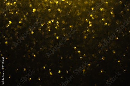 Golden Glittering Defocused Lights Abstract Background stock photo, Christmas Decoration