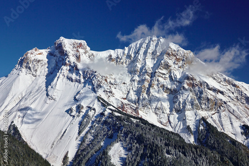 Bild auf Leinwand The snowy peak of Mount Garibaldi in clouds, Vancouver, British Columbia, Canada