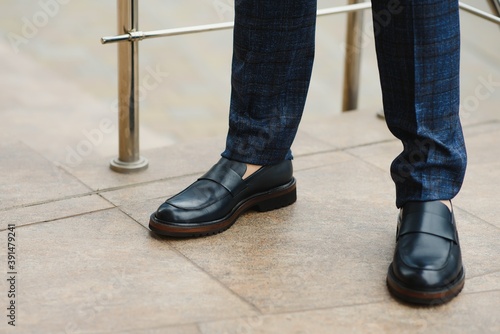 фотографія Stylish male person wearing trendy shoes