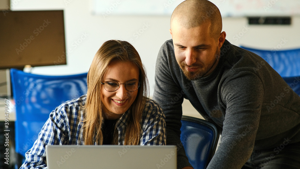 Girl and boyfriend working on computer, teamwork process. Girl and boyfriend working on computer, teamwork process.