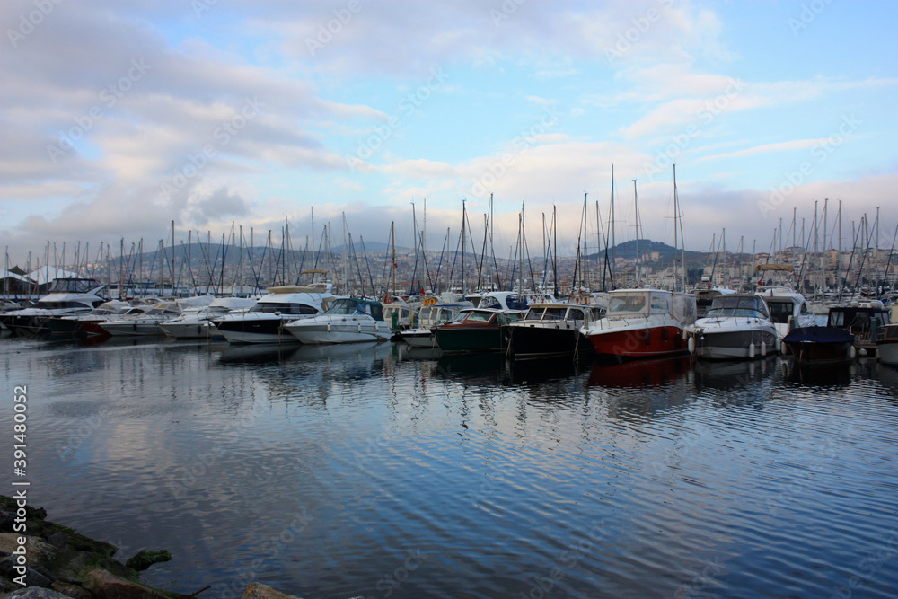 Lots of boats were dropped anchor to marina.