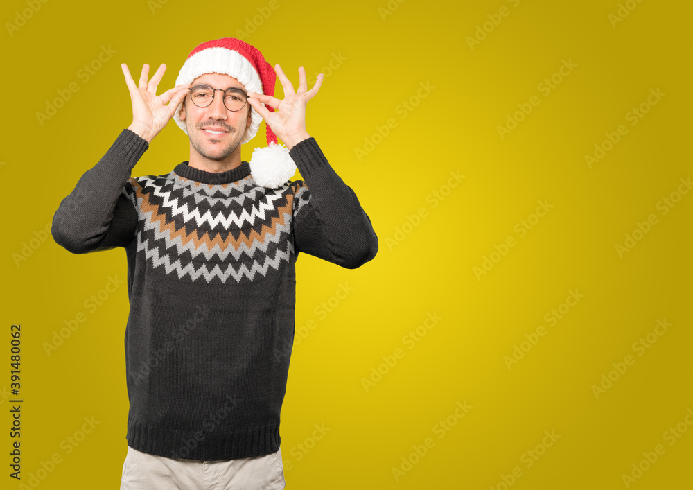 Christmas - Young man gesturing Christmas - Young man gesturing