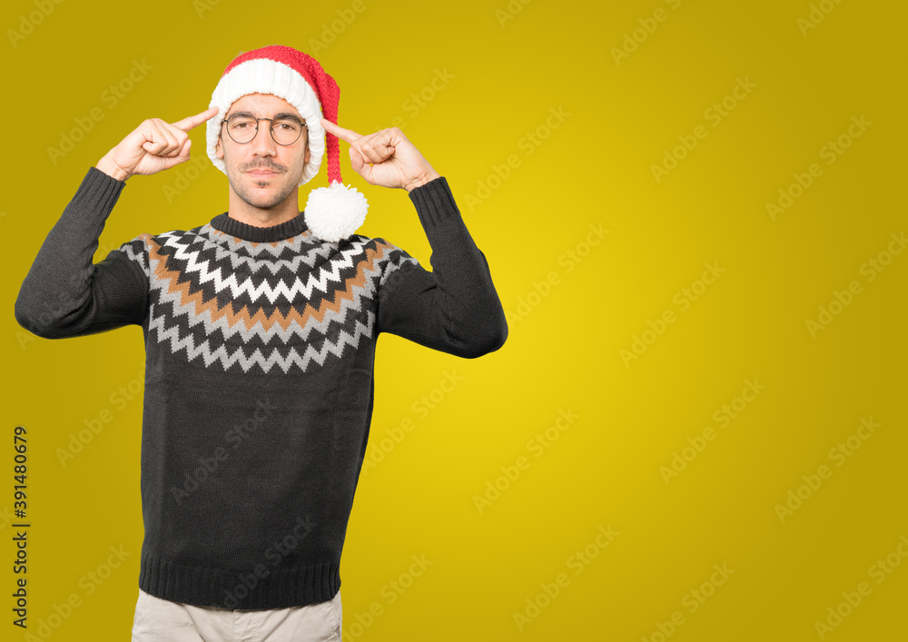 Christmas - Young man gesturing Christmas - Young man gesturing