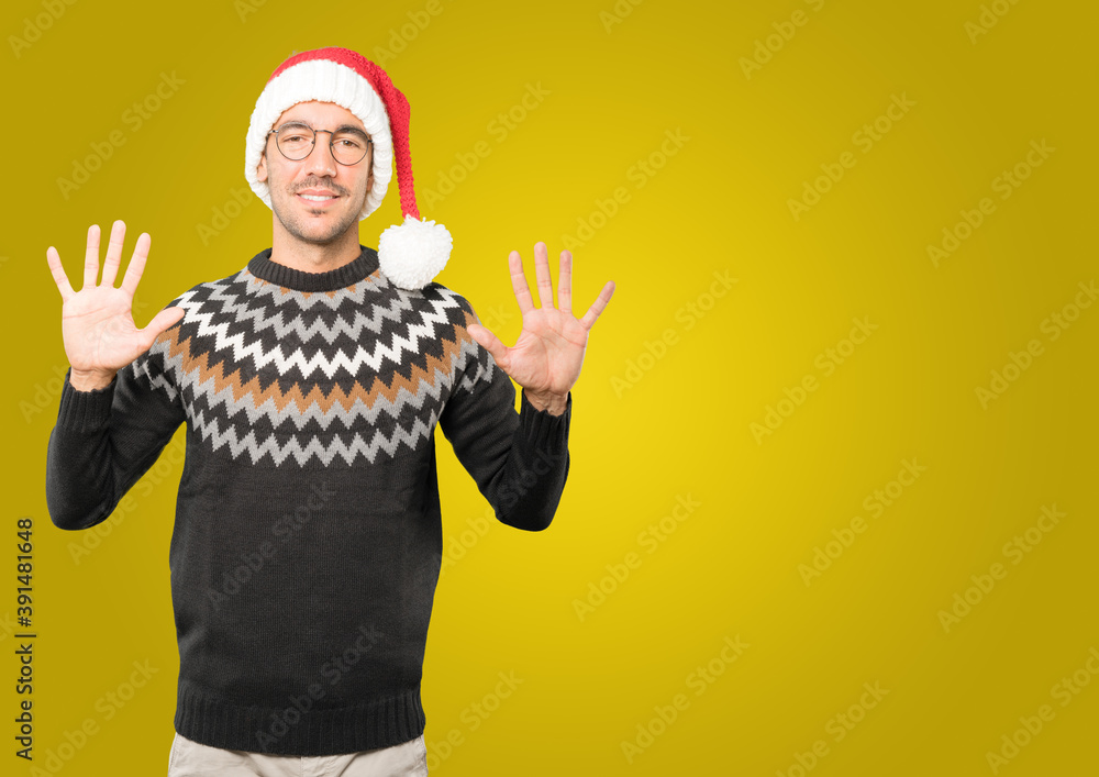 Christmas - Young man gesturing Christmas - Young man gesturing