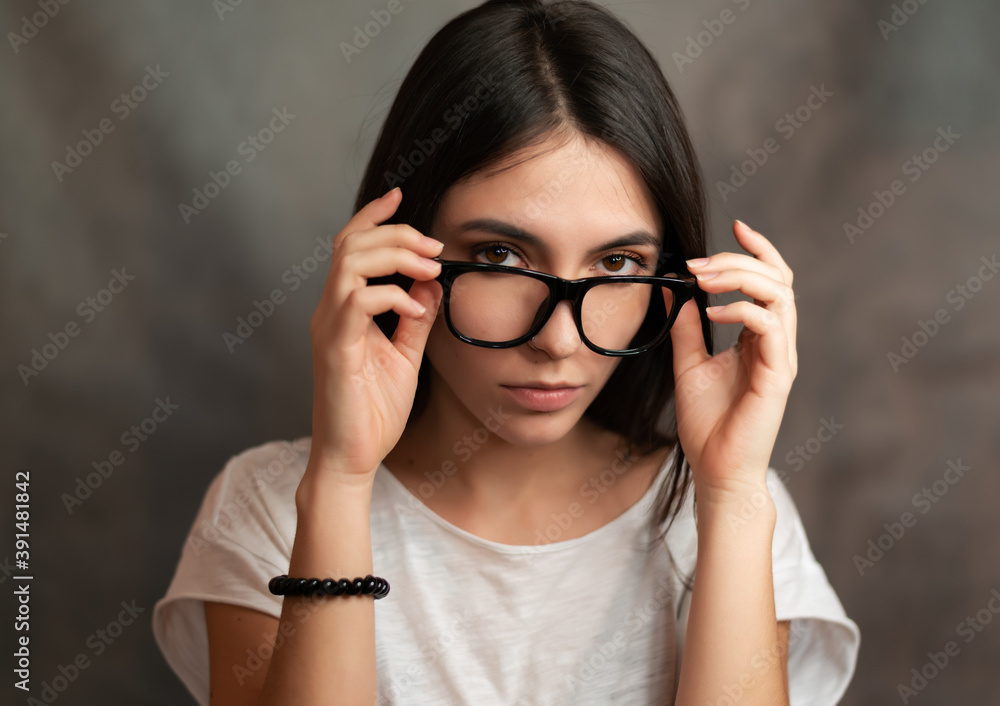Portrait of woman wearing glasses. Selective focus. Portrait of woman wearing glasses. Selective focus.