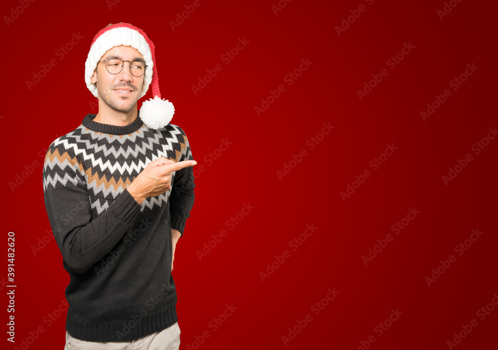 Christmas - Young man gesturing Christmas - Young man gesturing
