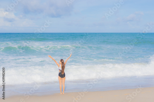 Portrait beautiful young asian woman relax smile around beach sea ocean