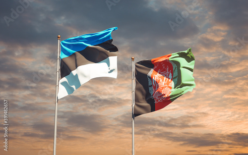 Beautiful national state flags of Afghanistan and Estonia together at the sky background. 3D artwork concept.