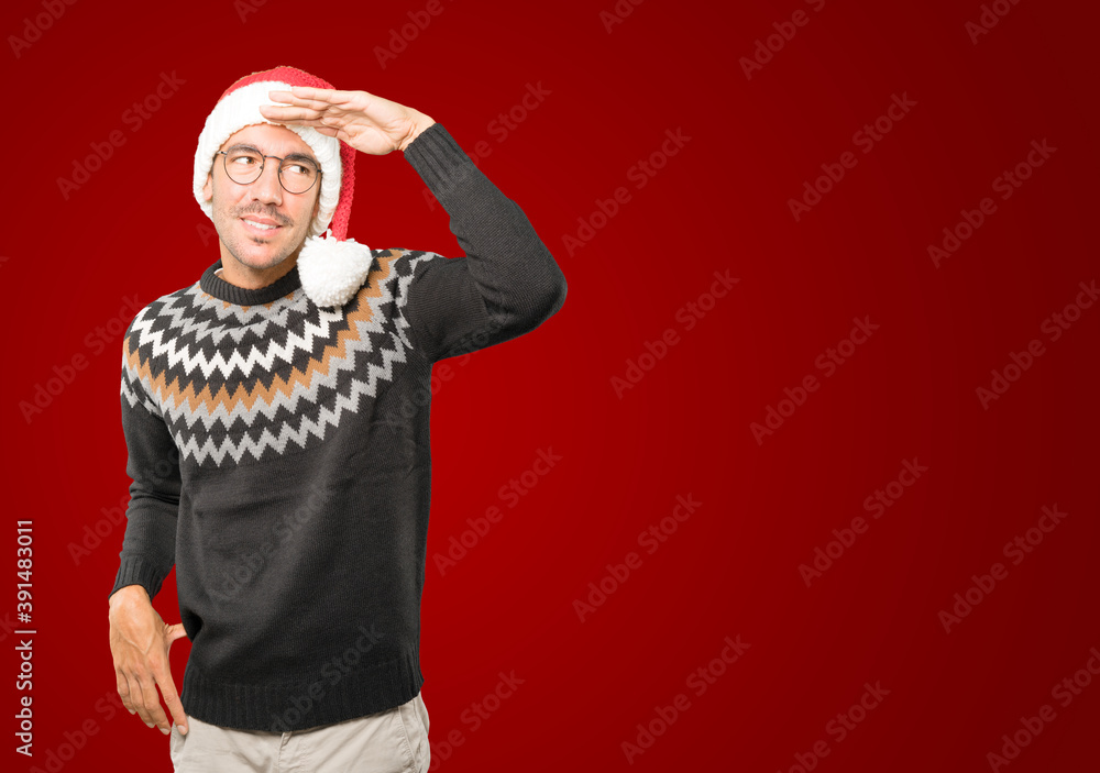 Christmas - Young man gesturing Christmas - Young man gesturing