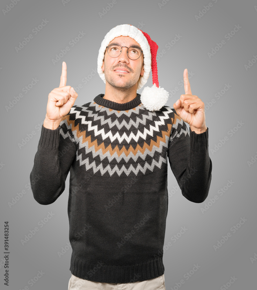 Christmas - Young man gesturing Christmas - Young man gesturing