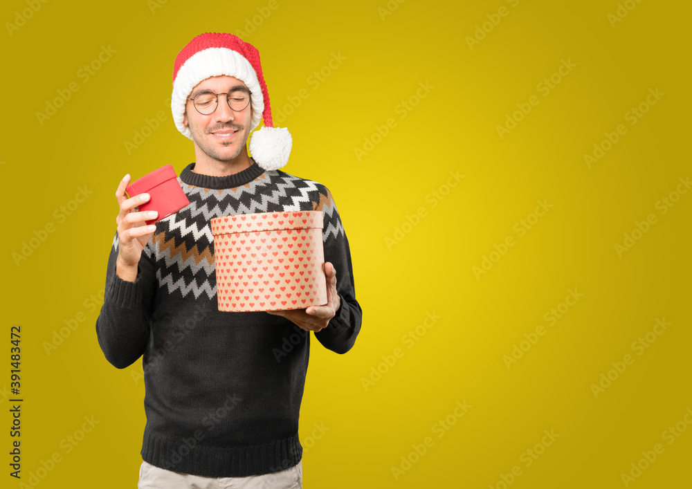 Christmas - Young man gesturing Christmas - Young man gesturing