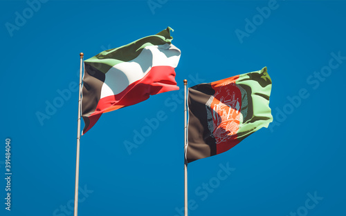 Beautiful national state flags of Kuwait and Afghanistan together at the sky background. 3D artwork concept.