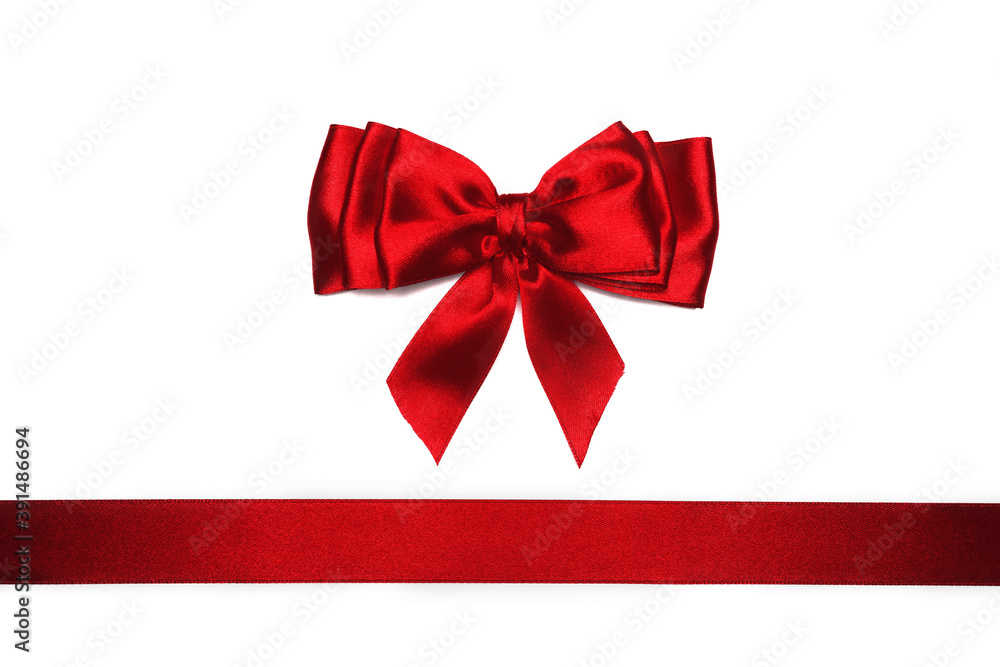 Red satin bow and ribbon on white background Red satin bow and ribbon on white background