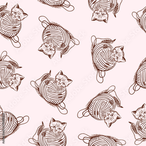 Seamless pattern with the image of a kitten entangled in a ball of thread drawn by hand in a cute cartoon style. Suitable for printing on paper, textiles, wallpaper and more.