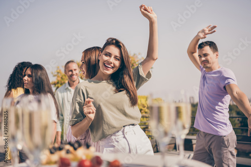 Canvas Print Photo of cool pretty girls guys have fun dancing meals drinks on table party on