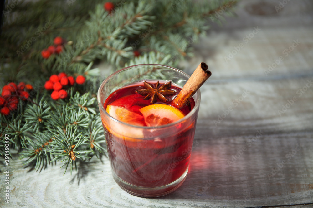 Christmas background, mulled wine on a light wooden surface Christmas background, mulled wine on a light wooden surface