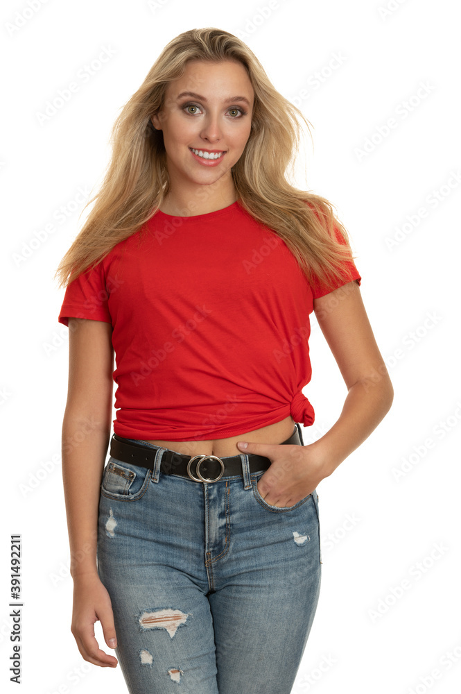 Fototapeta premium Portrait of a cute teenage girl in red tshirt over white