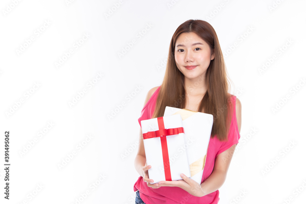 Attractive asian woman holding gift box in christmas, new year, valentine day, birthday celebration concept. Portrait of smiling happy pretty girl hold gift box on white background. Attractive asian woman holding gift box in christmas, new year, valentine day, birthday celebration concept. Portrait of smiling happy pretty girl hold gift box on white background.