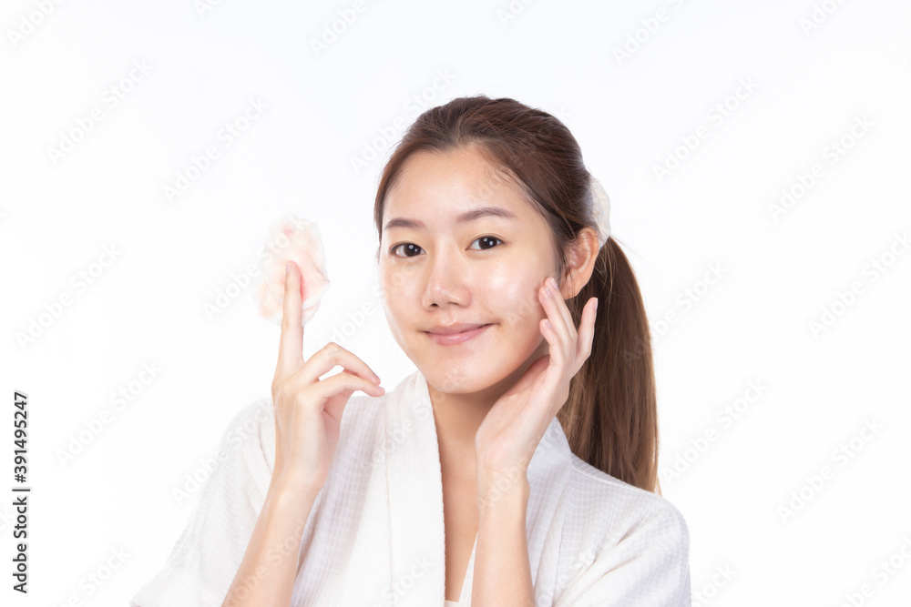 Attractive beauty young asian woman clean skin with cotton pad removing make up on white background. Attractive beauty young asian woman clean skin with cotton pad removing make up on white background.