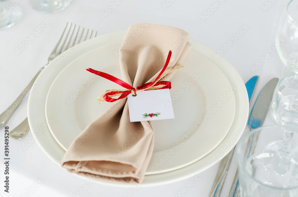 Festive table setting. Napkin plate and cutlery top view Festive table setting. Napkin plate and cutlery top view