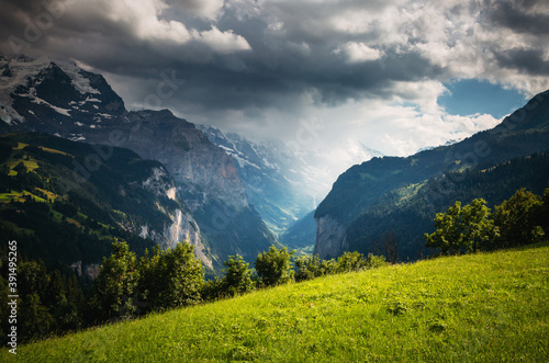Scenic surroundings near the alpine resort Wengen. Location place Swiss alp, Lauterbrunnen valley.