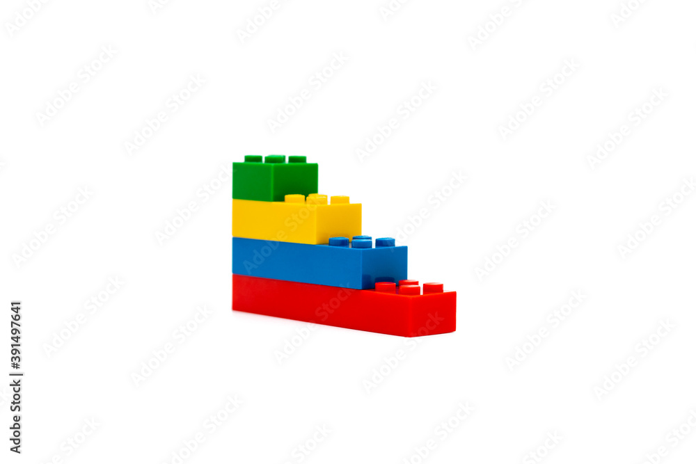 Multi-colored plastic building blocks. Toys and games. Multi-colored plastic building blocks. Toys and games.