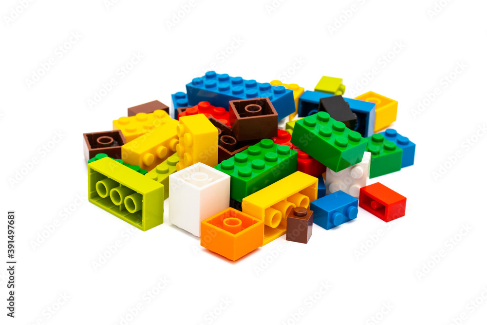 Fototapeta premium Multi-colored plastic building blocks. Toys and games.