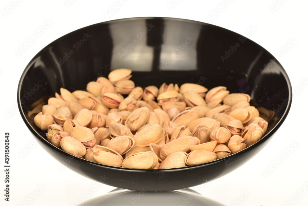 Delicious pistachios, close-up, on a white background. Delicious pistachios, close-up, on a white background.