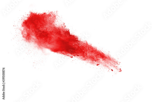 Obraz na plátne Freeze motion of red color powder exploding on white background.