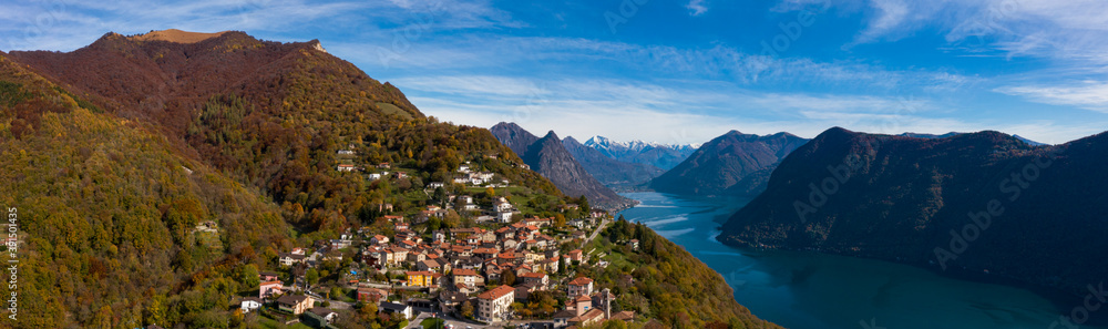 Aerial view of Lugano lake and the Monte Brè village in Canton Ticino