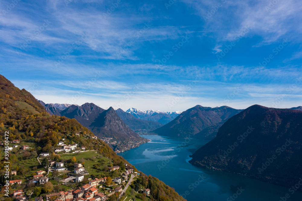 Aerial view of Lugano lake and the Monte Brè village in Canton Ticino