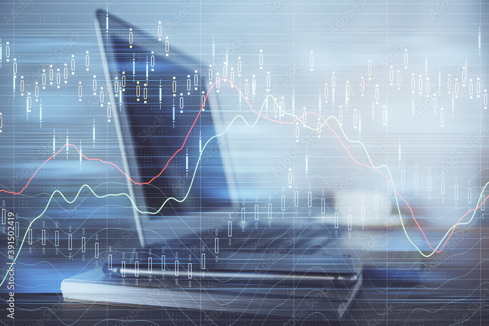Financial chart drawing and table with computer on background. Double exposure. Concept of international markets. Financial chart drawing and table with computer on background. Double exposure. Concept of international markets.
