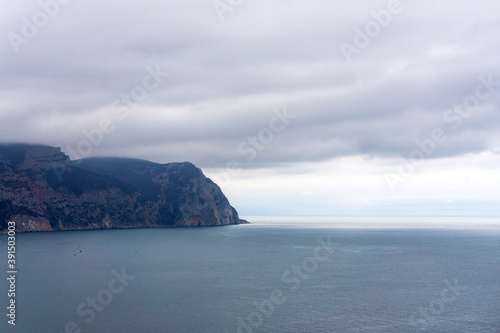 view from the cliff to the sea and ships in it © la_toja