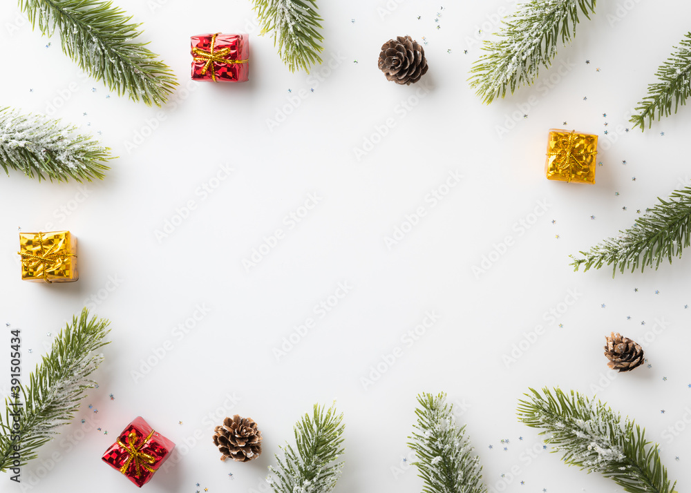 Fototapeta premium Top view of framing christmas decoration mockup arranging in minimal style. Merry christmas and Happy new year festival background concept.