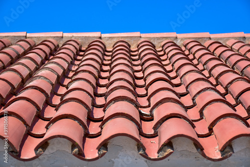 background of orange tiles on a roof