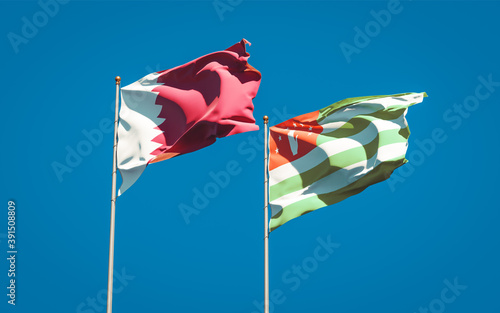 Beautiful national state flags of Qatar and Abkhazia.