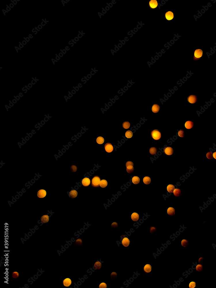 The golden side's or boke on a black background. Merry Christmas and happy New Year. Christmas background. The golden side's or boke on a black background. Merry Christmas and happy New Year. Christmas background.