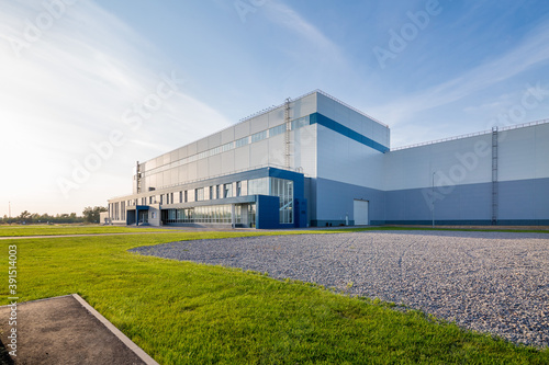 building of a modern industrial enterprise. Summer, blue sky photo
