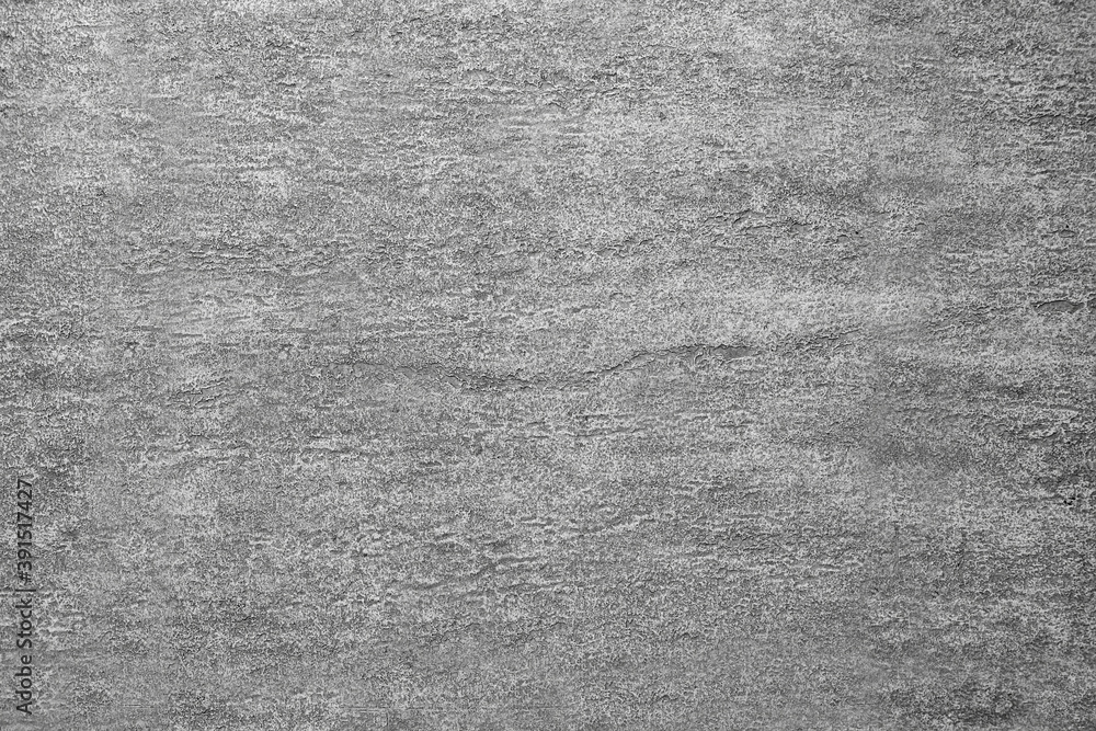 Grey old plaster close up. Textured grunge background Grey old plaster close up. Textured grunge background