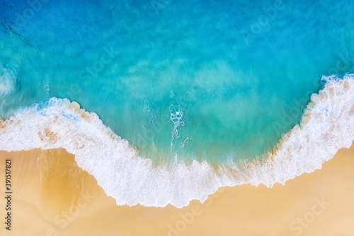 Fototapeta Naklejka Na Ścianę i Meble -  Beach and large ocean waves. Coast as a background from top view. Blue water background from drone. Summer seascape from air. Travel image