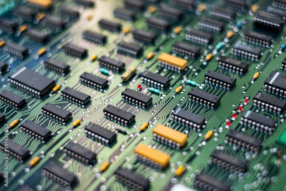 Closeup Electronic circuit board ( PCB )components detail and An integrated circuit (ic)