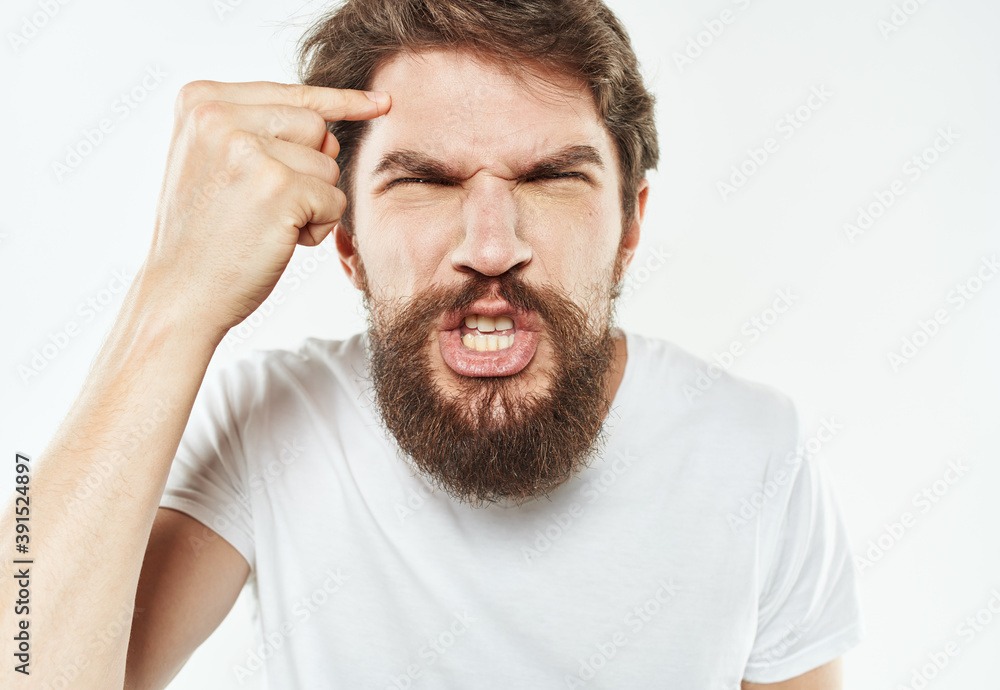 Aggressive man irritability emotions gesturing with model hands Aggressive man irritability emotions gesturing with model hands